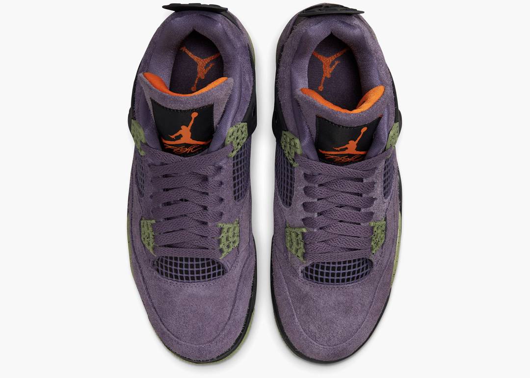 Jordan 4 Canyon Purple suola Nike Air e contrasto cromatico, sneaker Nike Air Jordan 4 Retro